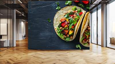 Two vegetarian tacos with roasted vegetables, beans, and fresh herbs Wall mural