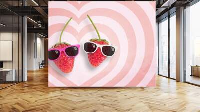 Couple strawberry wearing sunglasses on hearts pattern pink and white background with copy space.,Pastel tone. Wall mural