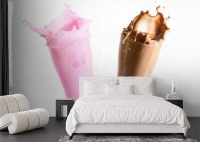 Strawberry milk and chocolate milk splashing out of glass., Isolated white background. Wall mural