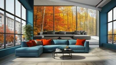 A bright, modern living room with a grey couch and a minimalist table, featuring large windows that reveal a vibrant autumn forest outside. Wall mural