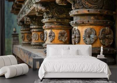 A close-up of the prayer wheels at Tiger's Nest Monastery, with intricate carvings on the wooden panels. Wall mural