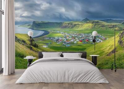 A panoramic view of the picturesque village of Gjgv, nestled between green hills and the ocean. Wall mural