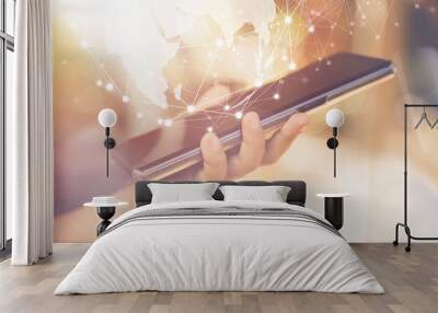 hand holding smartphone with global network, business and technology concept. Wall mural