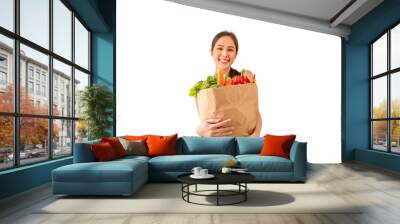 Happy asian woman holding paper bag full of fresh vegetable  isolated on white background. Wall mural