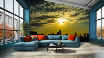 Building silhouette sunset colorful sky with cloud Wall mural