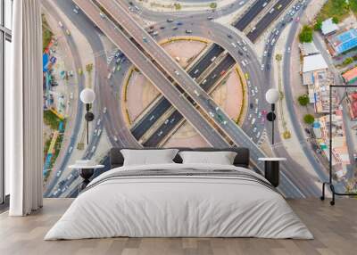 Circular junction cross transport road with car movement Wall mural