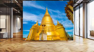 Golden pagoda in Wat phra kaew tourism landmark sightseeing of Bangkok Wall mural