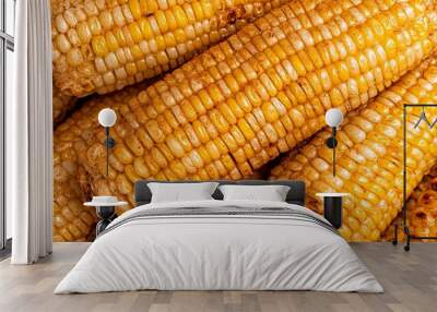 A pile of corn on a plate with a brownish color Wall mural