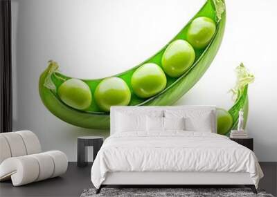 Two green peas are shown, one of which is cut in half Wall mural