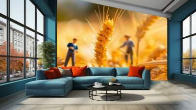 Two men are working in a field of wheat Wall mural