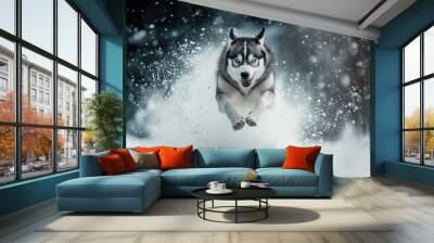 A dog is running through the snow with its paws in the air Wall mural