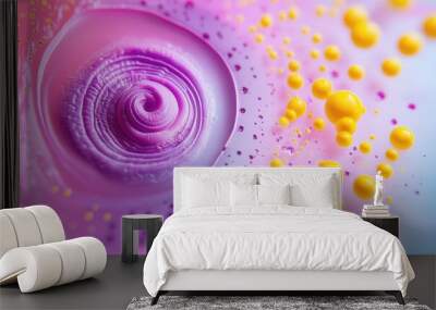 A swirl of purple and yellow paint with many small yellow balls Wall mural