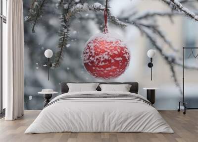 christmas ball on a tree. red christmas ball on spruce branch. christmas ball closeup. selective focus. Wall mural