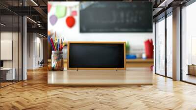 Empty board on a countertop, surrounded by school-themed decorations Wall mural