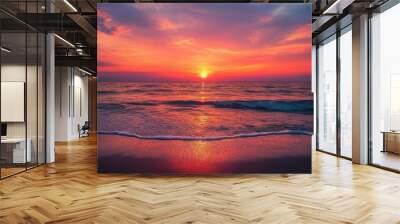 Fiery red sunset casting a warm glow over the beach Wall mural