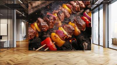 Meat and vegetable skewers roasting over coals Wall mural