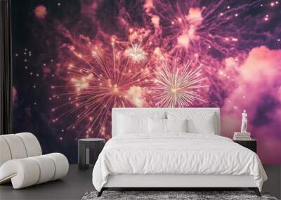 Pink fireworks in the sky with a cloudy background Wall mural