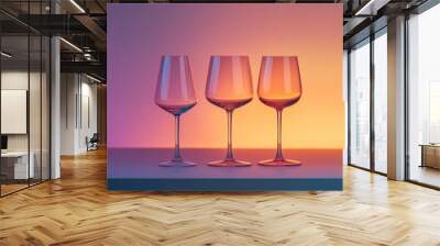 Three wine glasses are on a table Wall mural