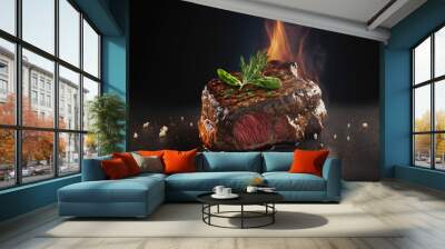 Yummy beef grill steak on a table in a dark black background with fire and smoke, food photograph, food styling Wall mural