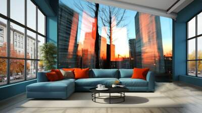 Abstract view of modern buildings at sunset with blurred motion effect. Wall mural