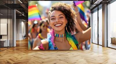 A vibrant stock photo capturing the energy of a pride parade, with a diverse group of people waving rainbow flags and smiling. Wall mural