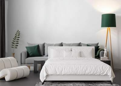 Modern interior with a gray sofa and wooden floor lamp on a white background, mockup template for product presentation. White wall background with a grey fabric couch and a green blanket. Wall mural