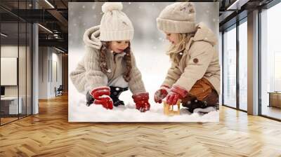 Children playing in the snow. This is a fun moment Wall mural