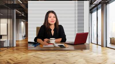 young beautiful and successful Asian Korean business woman working confident at modern office computer desk in female businesswoman success Wall mural