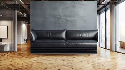 A modern interior setting featuring a stylish black leather couch against a white background. The sleek design of the couch adds a touch of sophistication to the room. Wall mural