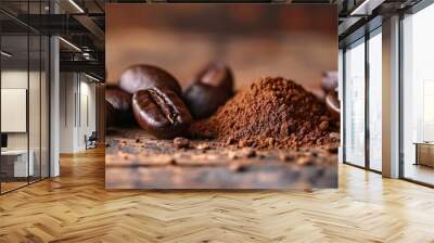 A still life photograph featuring a pile of coffee beans and ground coffee on a wooden table. The aroma of coffee fills the air, attracting terrestrial animals and wildlife with its rich scent Wall mural