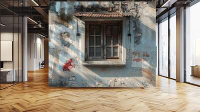 Ancient house with shadow of wooden window awning on old zinc and concrete wall Wall mural