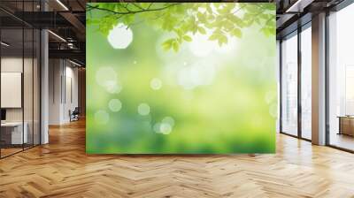 Blurry bokeh green background with trees and copy space for design Wall mural