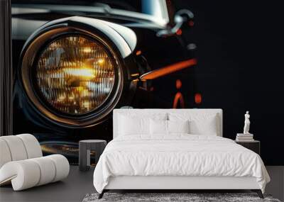 Classic car headlight with halogen bulb and high energy consumption on black background close up with copy space Wall mural