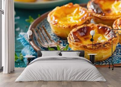 Classic Egg Custard Tarts on Blue Tile with a Fork in Focus Wall mural