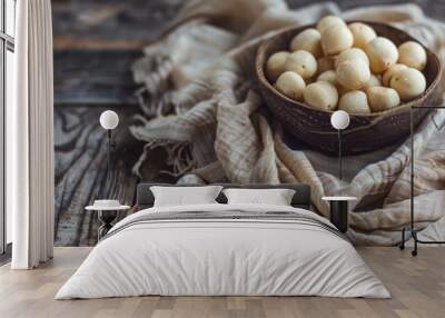 Macadamia nut and vintage cloth on wooden surface signify superfoods and healthful eating Wall mural