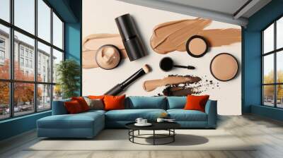 Makeup flat lay with foundation and accessories on light background Wall mural