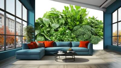 Pile of fresh green veggies on a white background Wall mural