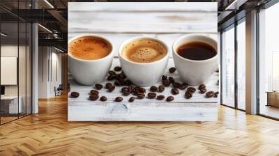 Two cups of aromatic coffee and coffee beans on a rustic white wooden table Wall mural