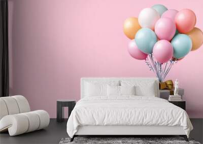 Vibrant card design showcasing a joyful bundle of balloons tied to a large festive gift box. Wall mural