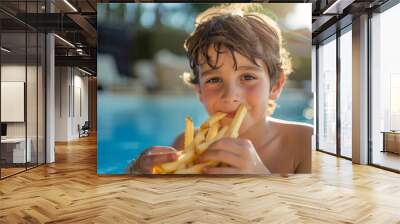 A boy at swimming pool with french fries Wall mural