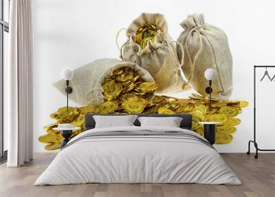 Stacking gold coin in treasure sack on white background Wall mural