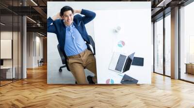 Happy of successful asian young businessman on laptop computer, tablet with blank touch screen isolated and Pen on notebook on White wooden table background in office top view Wall mural