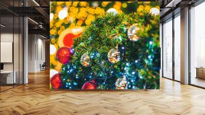 Merry x-mas,Close up of Colorful balls ,gifts box and Christmas greeting picture parcel decoration on Green Christmas tree background Decoration During Christmas and New Year. Wall mural