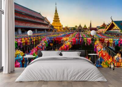 The Beautiful Lanna lamp lantern are northern thai style lanterns in Loi Krathong or Yi Peng Festival at Wat Phra That Hariphunchai is a Buddhist temple in Lamphun, Thailand. Wall mural