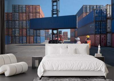 Foreman control loading containers box from cargo freight ship for import export, Foreman control industrial container cargo freight ship, Business import and export logistic concept. Wall mural