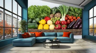 Healthy produce selection in a supermarket basket on a light background, with ample copy space Wall mural