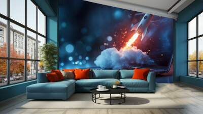 Rocket launching from a laptop screen, symbolizing innovation and creativity, set against a dynamic background. Wall mural