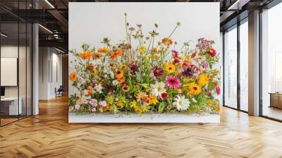 Elegant white backdrop showcasing wildflowers in full autumn bloom, capturing the vivid hues and cheerful nature of the seasonal floral arrangement Wall mural