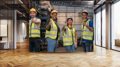 Portrait of warehouse worker. Group of factory industry worker in industrial plants. Team of workers and engineer showing thumb up in Factory at production. Wall mural