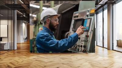 The technician is working in a steel factory. Engineer officer in engine control. Factory worker or engineer doing machine job in adept manufacturing workshop. Wall mural